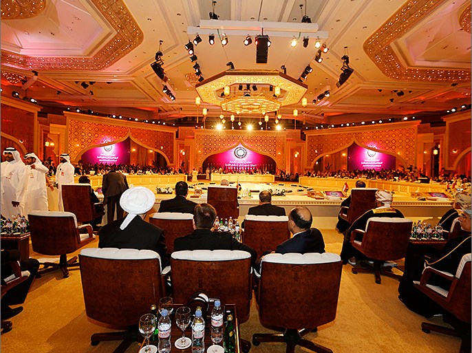 Leaders from Arab states are seen attending the opening of the Arab League summit in Doha March 26, 2013. A summit of Arab heads of state opened in the Qatari capital Doha on Tuesday expected to focus on the war in Syria as well as on the Israeli-Palestinian conflict. REUTERS/Ahmed Jadallah (QATAR - Tags: POLITICS)