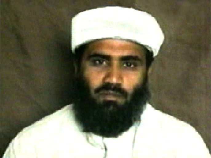 NIK01 - 20020623 - DOHA, QATAR : This video grab taken 23 June 2002 from the Qatar-based al-Jazeera satellite television channel shows a photo of Suleiman Abu Ghaith, a spokesman for the al-Qaeda network, who announced in a recorded statement that chief terror suspect Osama bin Laden, his right-hand man Ayman Zawahri and fugitive Afghan Taliban Mullah Mohammad Omar were alive and threatened new attacks on the US. Abu Ghaith referred to 'the eight months that have passed' since the US launched its military campaign in October, indicating his statement was recorded in June. Abu Ghaith was stripped of his Kuwaiti citizenship because of his alleged links to the September 11 attacks blamed on al-Qaeda. EPA PHOTO AL-JAZEERA /-/ja/nk