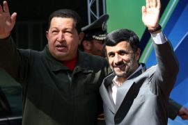 epa03611407 (FILE) A file picture dated 02 April 2009 shows Iranian President Mahmoud Ahmadinejad (R) and Venezuelan President Hugo Chavez (L) lpose for the photographers during a welcome ceremony, marking the start of a two-day visit, at the presidential palace in Tehran, Iran. According to a statement by the Venezuelan government on 05 March 2013,