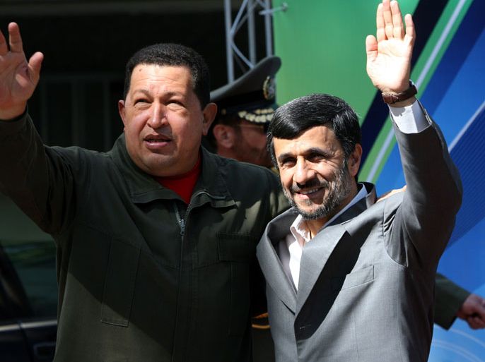 epa03611407 (FILE) A file picture dated 02 April 2009 shows Iranian President Mahmoud Ahmadinejad (R) and Venezuelan President Hugo Chavez (L) lpose for the photographers during a welcome ceremony, marking the start of a two-day visit, at the presidential palace in Tehran, Iran. According to a statement by the Venezuelan government on 05 March 2013,