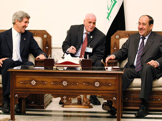 U.S. Secretary of State John Kerry meets with Iraq's Prime Minister Nouri al-Maliki in Baghdad, Iraq, March 24, 2013. Kerry made an unannounced visit to Iraq on Sunday and will urge al-Maliki to make sure Iranian flights over Iraq do not carry arms and fighters to Syria, a U.S. official said. REUTERS/Jason Reed (IRAQ - Tags: POLITICS TPX IMAGES OF THE DAY)