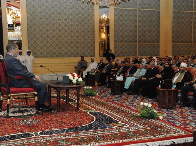 مرسي يلتقي الجالية المصرية في قطر