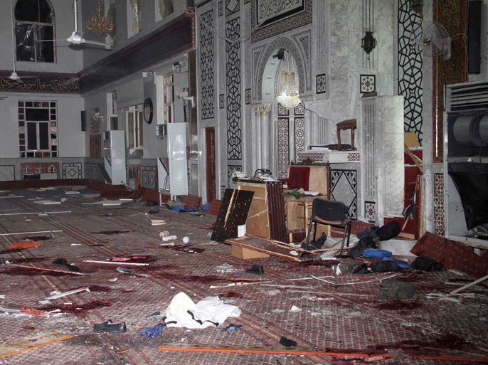 DAM1791 - Damascus, -, SYRIA : An image made available by the Syrian Arab News Agency (SANA) on March 21, 2013 shows remains and the carpeted floor covered with blood inside of the Iman Mosque in the Mazraa neighbourhood of the Syrian capital Damas, after a suicide attack on March 21, 2013. The attack killed a senior pro-regime Sunni cleric, Syrian state television reported and left dozens of people injured. AFP PHOTO /HO-SANA. AFP PHOTO / HO / SANA === RESTRICTED TO EDITORIAL USE - MANDATORY CREDIT "AFP PHOTO / HO / SANA" - NO MARKETING NO ADVERTISING CAMPAIGNS - DISTRIBUTED AS A SERVICE TO CLIENTS ==