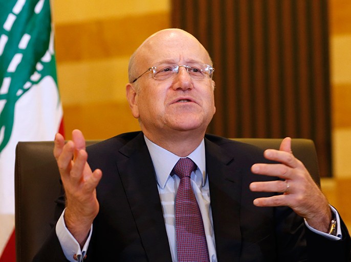 Lebanon's Prime Minister Najib Mikati talks during an interview with Reuters at the Grand Serail, the government headquarters in Beirut March 12, 2013. Mikati urged Arab states to help Lebanon cope with a flood of Syrian refugees who are stretching its scarce resources and will need at least $370 million in support this year. Picture taken March 12, 2013. To match Interview SYRIA-CRISIS/LEBANON REUTERS/Jamal Saidi (LEBANON - Tags: POLITICS PROFILE)