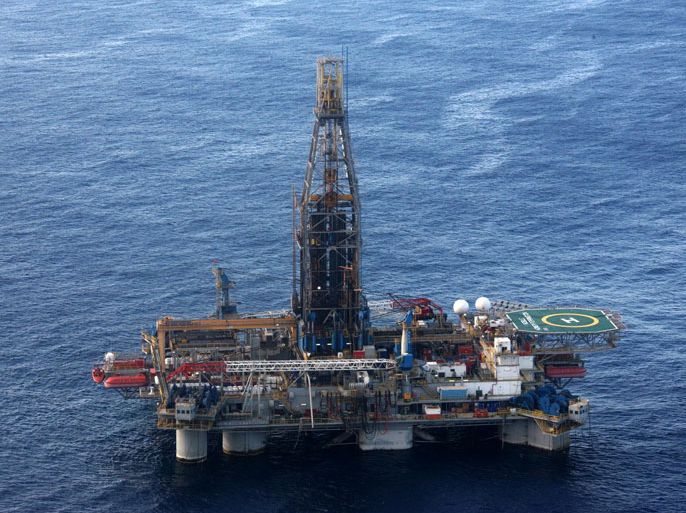 epa03010734 An aerial view from a helicopter of the Homer Ferrington rig operated by Noble Energy in the east Mediterranean, drilling in an offshore block on concession from the Cypriot government, 21 November 2011. Houston-based Noble started drilling for gas off Cyprus in September, in the island's first attempt to tap speculated offshore hydrocarbons deposits. Cypriot President Demetris Christofias visited the rig, which started drilling for gas on 21 November. EPA/STR