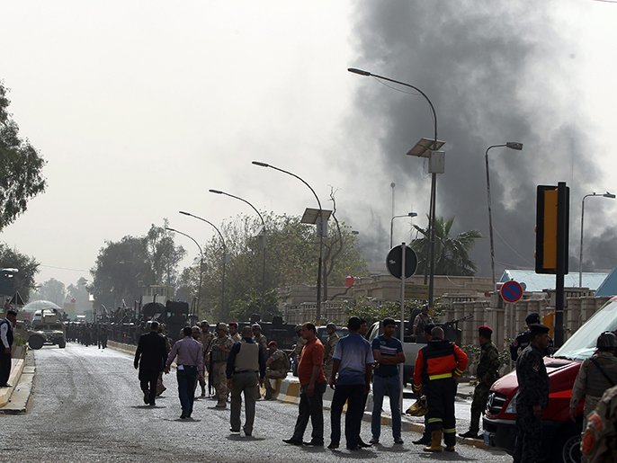 ‪الهجوم على مقر وزارة العدل العراقية أوقع 30 قتيلا حسب حصيلة جديدة‬ (الفرنسية)