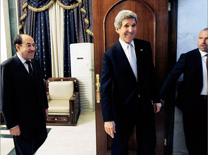 U.S. Secretary of State John Kerry after meeting with Iraqi Prime Minister Nouri Maliki, left, in Baghdad on Sunday. (Jason Reed / Associated Press / March 24, 2013)