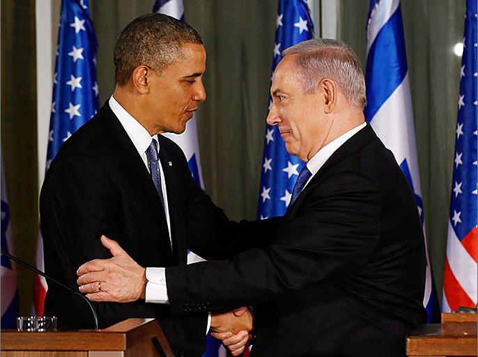 U.S. President Barack Obama and Israel's Prime Minister Benjamin Netanyahu shake hands while they hold a joint news conference at the Prime Minister's residence in Jerusalem, March 20, 2013. Making his first official visit to Israel, Obama pledged on Wednesday unwavering commitment to the security of the Jewish State where concern over a nuclear-armed Iran has clouded bilateral relations. REUTERS/Larry Downing (JERUSALEM - Tags: POLITICS)