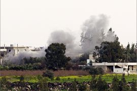 A picture taken from the Israeli side in the Golan Heights shows smoke after shells exploded in the Syrian village of al-Jamlah, close to the ceasefire line between Israel and Syria, on March 7, 2013. Israel expressed concern that the UN peacekeeping force in the Golan Heights could pull out altogether after Syrian rebels snatched 21 of their troops in the ceasefire zone bordering Israel. AFP PHOTO/JACK GUEZ