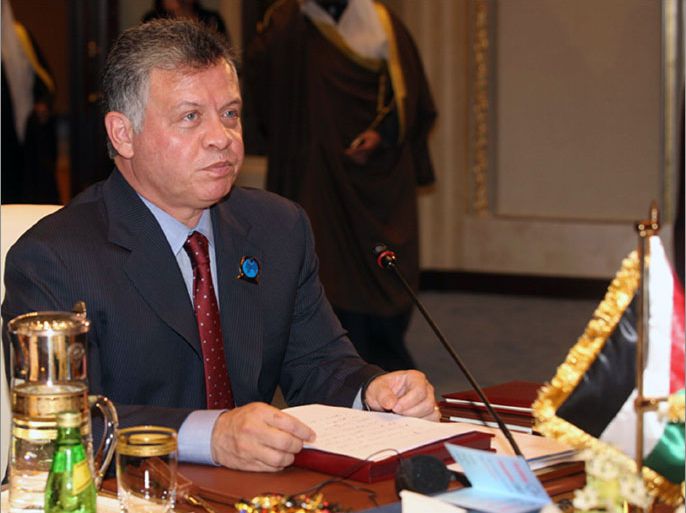 Jordan's King Abdullah II attends the opening ceremony of the International Humanitarian Pledging Conference for Syria at Bayan palace in Kuwait City on January 30, 2013.