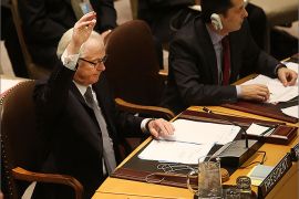 NEW YORK, NY - MARCH 07: Russia's U.N. Ambassador Vitaly Churkin votes at a U.N. Security Council meeting on imposing a fourth round of sanctions against North Korea in an attempt to halt its nuclear and ballistic missile programs on March 7, 2013 in New York City. North Korea vowed today to launch a preemptive nuclear strike against the United States. Spencer Platt/Getty Images/AFP== FOR NEWSPAPERS, INTERNET, TELCOS & TELEVISION USE ONLY ==