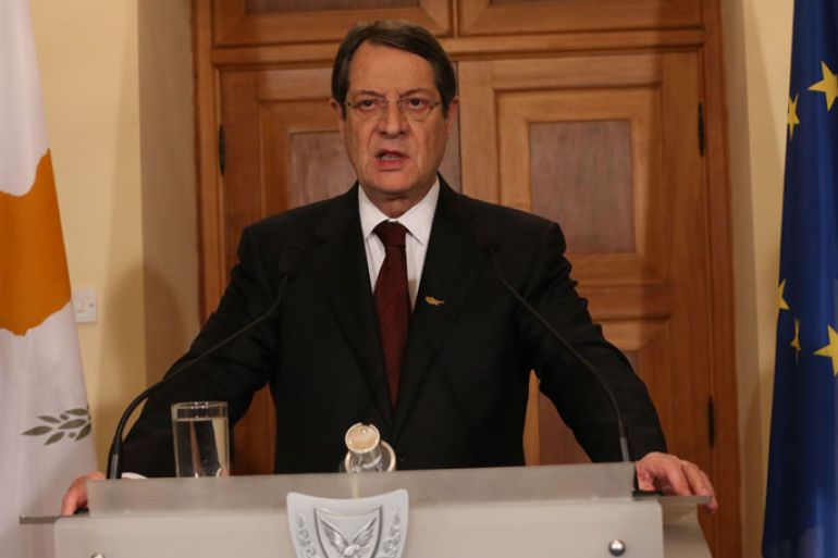 epa03629604 A Cypriot press and information office handout photograph shows Cypriot President Nicos Anastasiades speaking the people of Cyprus in a televised address , Nicosia, Cyprus late 17 March 2013, following the 16 March bailout agreement reached at a Eurogroup meeting to rescue the banking sector and the island`s economy. The President said the agreement may be painful but it was the only option EPA/CYPRIOT PRESS OFFICE / HANDOUT EDITORIAL USE ONLY/NO SALES EDITORIAL USE ONLY/NO SALES