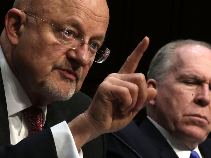 WASHINGTON, DC - MARCH 12: Director of National Intelligence James Clapper (L), and CIA Director John Brennan (R) testify during a hearing before the Senate (Select) Intelligence Committee March 12, 2013 on Capitol Hill in Washington, DC. The committee held a hearing on "Current and Projected National Security Threats to the United States." Alex Wong/Getty Images/AFP== FOR NEWSPAPERS, INTERNET, TELCOS & TELEVISION USE ONLY ==