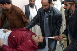 The body of Pakistani district election commissioner Ziaullah Qasmi is brought into a hospital following an attack by gunmen in Quetta on March 12, 2013. Gunmen shot dead a senior local election official in southwest Pakistani on March12