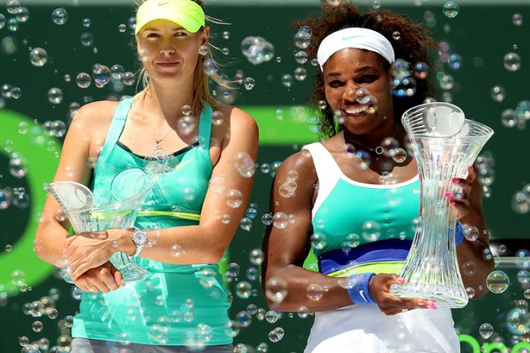 KEY BISCAYNE, FL - MARCH 30: Maria Sharapova of Russia and Serena Williams pose for photographers after the final of the Sony Open at Crandon Park Tennis Center on March 30, 2013 in Key Biscayne, Florida. Matthew Stockman/Getty Images/AFP== FOR NEWSPAPERS, INTERNET, TELCOS &amp; TELEVISION USE ONLY ==