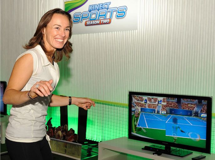 epa02868423 Handout image released by PR Newswire on Tuesday, August 16 2011. Today, five-time Grand Slam winner Martina Hingis revealed tennis would feature on ‘Kinect Sports: Season Two’, a new, upcoming game for Xbox 360 which is set for worldwide release from October 25, 2011. Appearing at ‘gamescom’, Europe’s biggest gaming convention, Martina enjoyed the controller-free fun of the game which takes advantage of Xbox 360's revolutionary Kinect full-body-tracking technology - no controller required.