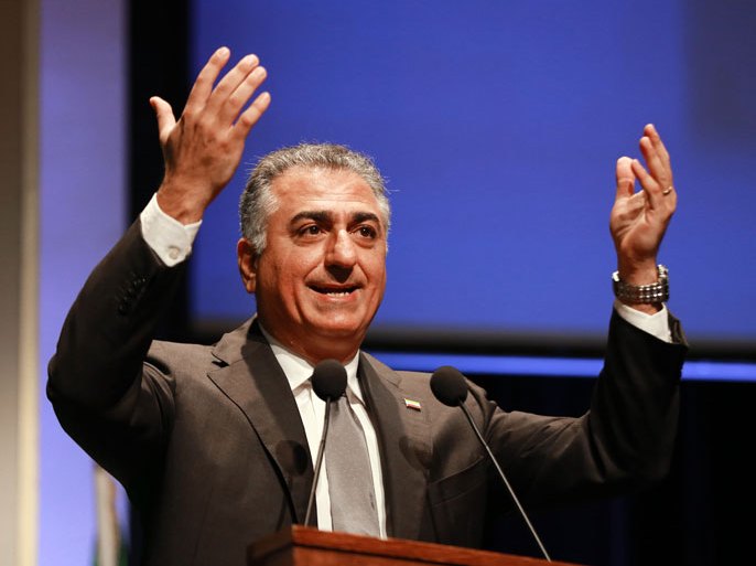 Iran's former crown Prince Reza Pahlavi delivers a speech at the opening of the National Council of Resistance of Iran (NCRI) on April 27, 2013 in Paris. Founded in 1981 in France, the NCRI is the parliament in exile of the "Iranian Resistance", gathering five Iranian opposition political organisations, including the Mujahedeen-e-Khalq (MEK, People's Mujahedin of Iran). AFP PHOTO PIERRE VERDY