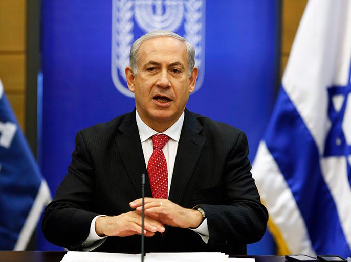 Israel's Prime Minister Benjamin Netanyahu gestures as he speaks during a Likud party meeting at the Knesset, the Israeli parliament, in Jerusalem April 22, 2013. REUTER/Baz Ratner (JERUSALEM - Tags: POLITICS)