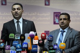 Muqdad al-Sharifi (R), chief electoral officer of Independent High Electoral Commission, holds a joint press conference with the commission's vice president Gaata al-Zobaie on the upcoming provincial elections in Baghdad on April 11, 2013. Iraq is due to hold provincial polls in 12 of its 18 provinces on April 20. AFP PHOTO/AHMAD AL-RUBAYE