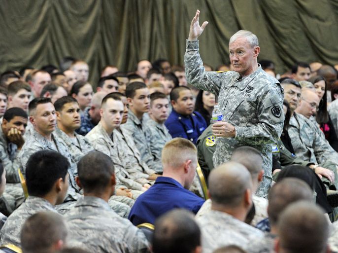 KIT135 - Tokyo, -, JAPAN : General Martin Dempsey, chairman of the US Joint Chiefs of Staff (R) gestures during his meeting with US military servicemen upon his arrival at the Yokota US military airbase in Tokyo on April 25, 2013. AFP PHOTO / TOSHIFUMI KITAMURA