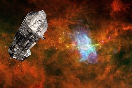 An undated image shows a superimposed picture of the ESA's Herschel space observatory set against a background image of the Vela C star-forming region. ESA’s Herschel space observatory has exhausted its supply of liquid helium coolant on April 29, 2013 ending more than three years of pioneering observations of the cool Universe. The liquid helium was essential to cool the observatory’s instruments to close to absolute zero, allowing Herschel to make highly sensitive observations of the cold Universe until today.