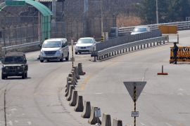 A South Korean military vehicle (L) leads cars arriving from the Kaesong joint industrial park in North Korea, at a military check point of the inter-Korean transit office in Paju on April 3, 2013 after being refused access to the Seoul-funded Kaesong complex . North Korea blocked South Korean access to a key joint industrial zone on April 3, in a sharp escalation of tensions as Washington condemned Pyongyang's "dangerous, reckless" behaviour