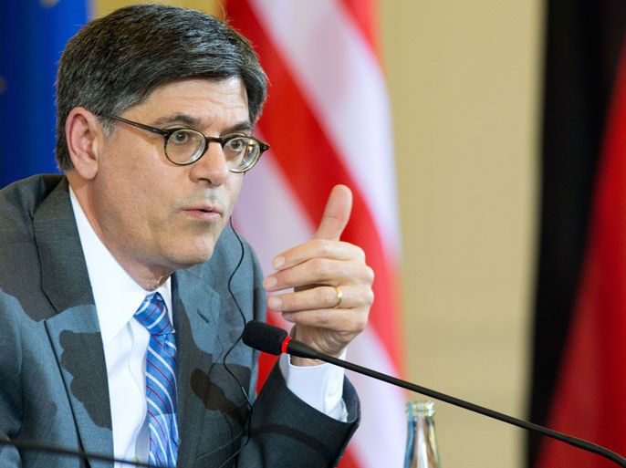 epa03654977 US Treasury Secretary Jacob J. Lew speaks during a joint news conference with Federal Finance Minister Wolfgang Schaeuble (unseen) following their meeting in Berlin, Germany, 09 April 2013. Lew is on a tour through European countries. EPA/MAURIZIO GAMBARINI