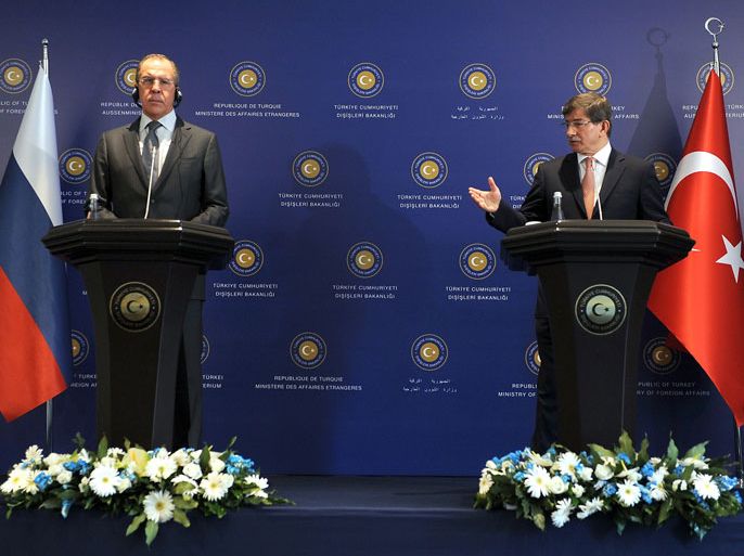 Russian Foreign Minister Sergei Lavrov (L) and his Turkish counterpart Ahmet Davutoglu (R) give a press conference following the Turkey-Russia Joint Strategic Planning Group third meeting on April 17, 2013 in Istanbul. Lavrov on Wednesday said the Friends of Syria grouping of Western and Arab countries opposed to the rule of President Bashar al-Assad undermined dialogue. Lavrov's comments came ahead of a key Friends of Syria meeting in Istanbul on Saturday to be attended by US Secretary of State John Kerry as well as several of his Western and Arab counterparts. AFP PHOTO / OZAN KOSE