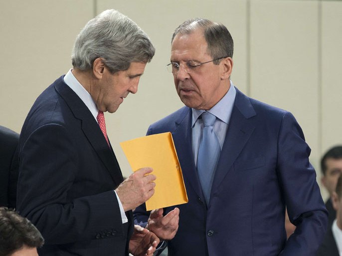 Russian Foreign Minister Sergei Lavrov (R) hands a folder to US Secretary of State John Kerry before a Nato Russia Foreign Affairs ministers meeting at the Nato Headquarters in Brussels on April 23, 2013. AFP