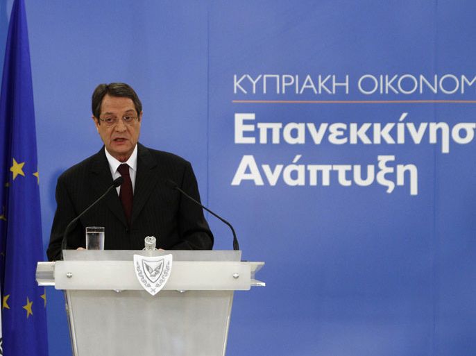 epa03669009 Cypriot President Nicos Anastasiades announces the government's measures for the economy, at the Presidential Palace in Nicosia, Cyprus, 19 April 2013. According to reports, under a 23-billion-euro (30-billion-dollar) bailout deal reached with international creditors, depositors with more than 100,000 euros in the island's two biggest banks, the Bank of Cyprus and Laiki, will suffer big losses. EPA/KATIA CHRISTODOULOU