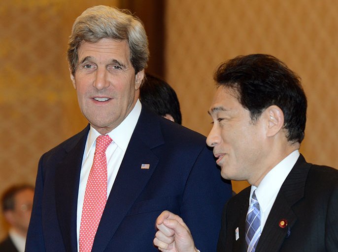 Tokyo, -, JAPAN : US Secretary of State John Kerry (L) chats with Japanese Foreign Minister Fumio Kishida (R) prior to their talks at the foreign ministry's Iikura guesthouse in Tokyo on April 14, 2013. US Secretary of State John Kerry arrived in Japan on April 14 to discuss nuclear tensions on the Korean peninsula after securing vital support from China to help defuse the weeks-long crisis. AFP PHOTO / TOSHIFUMI KITAMURA
