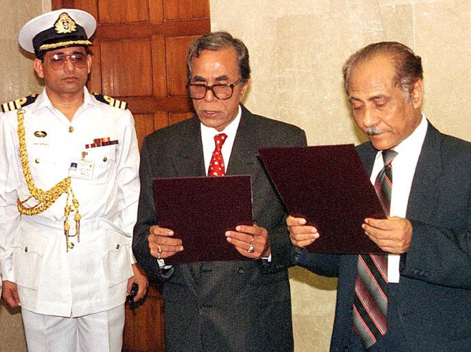 f/(FILES) In this photograph taken on July 13, 2001, then Bangladeshi President Shahabuddin Ahmed (R) takes the oaths of Abdul Hamid (2R) as the speaker of the parliament while then Prime Minister Sheikh Hasina Wajed (L) looks on, at the parliament house in Dhaka.