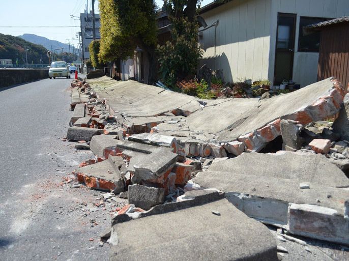 JAPAN : A concrete wall has collapsed in Sumoto, on Awaji island, Hyogo prefecture, western Japan on April 13, 2013 after a strong earthquake attacked. A 6.3 magnitude earthquake hit western Japan, injuring at least 15 people and destroying some houses