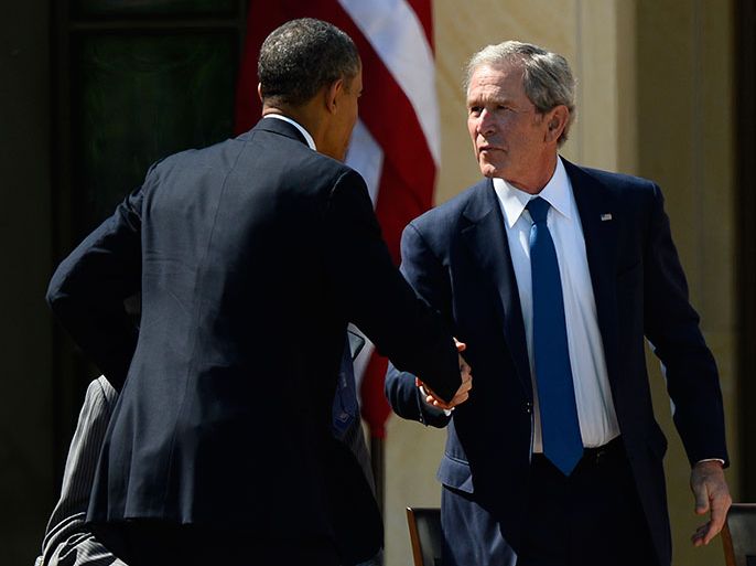 epa03676789 Former US President George W. Bush (R) shakes hands with President Barack Obama (L) at the ceremonial dedication of the George W. Bush Presidential Library on the campus of Southern Methodist University in Dallas, Texas, 25 April 2013. All the living former United States Presidents, George W. Bush, Jimmy Carter, George H. W. Bush, Bill Clinton, and current United States President Barack Obama attended the ceremony. EPA/LARRY W. SMITH