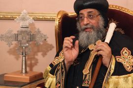 Coptic Pope Tawadros II, head of Coptic Orthodox church, gestures during an interview with Reuters in Cairo, April 25, 2013. Egypt's Christians feel sidelined, ignored and neglected by Muslim Brotherhood-led authorities, who proffer assurances but have taken little or no action to protect them from violence, the pope said. In his first interview since emerging from seclusion after eight people were killed in sectarian violence between Muslims and Christians this month