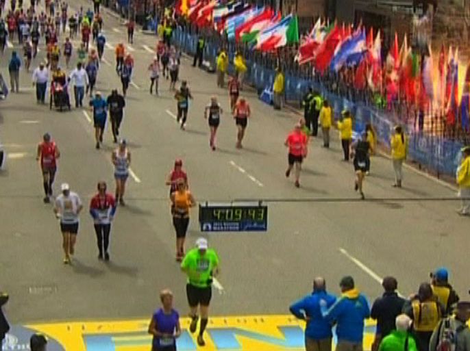 Still image taken from video courtesy of NBC shows an explosion at the Boston Marathon, April 15, 2013. Two explosions struck the marathon as runners crossed the finish line on Monday, witnesses said, injuring an unknown number of people on what is ordinarily a festive day in the city. REUTERS/NBC/Handout (UNITED STATES - Tags: CRIME LAW SPORT ATHLETICS CIVIL UNREST TPX IMAGES OF THE DAY) FOR EDITORIAL USE ONLY. NOT FOR SALE FOR MARKETING OR ADVERTISING CAMPAIGNS. THIS IMAGE HAS BEEN SUPPLIED BY A THIRD PARTY. IT IS DISTRIBUTED, EXACTLY AS RECEIVED BY REUTERS, AS A SERVICE TO CLIENTS. NO ARCHIVES. CNN OUT. AOL OUT. YAHOO OUT. MASSACHUSETTS MEDIA MARKET WEBSITES OUT