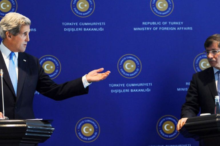: US Secretary of State John Kerry (L) speaks during his press conference with his Turkish counterpart Ahmet Davutoglu on April 7, 2013 in Istanbul. Kerry arrived on April 7 in Turkey to discuss Syria's civil war and the Middle East peace process as well as to bolster the Turkish-Israeli rapprochement brokered two weeks ago by Washington