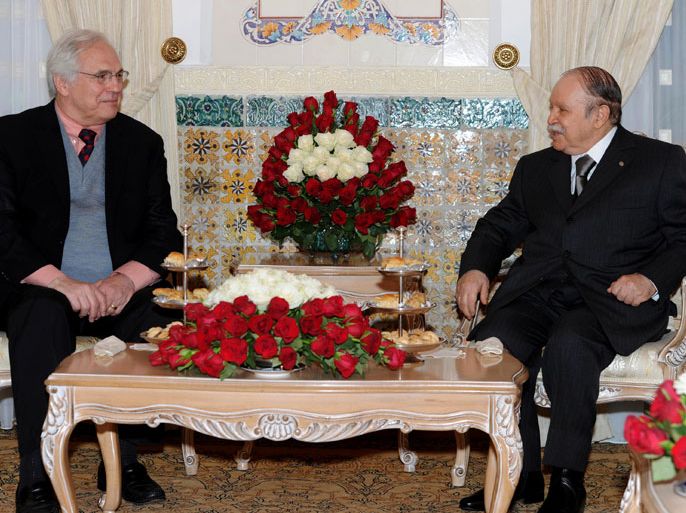 UN envoy on the Western Sahara Christopher Ross (L) meets with Algerian President Abdelaziz Bouteflika in Algiers on April 1, 2013. The UN envoy began a tour of the region last month aimed at reviving direct peace talks between Morocco and the Algeria-backed Polisario Front separatists, after numerous rounds of UN-hosted informal negotiations failed to make any progress. AFP PHOTO / FAROUK BATICHE
