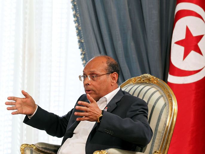 epa03532579 Tunisian president Moncef Marzouki during an interview with French journalist Vanessa Burggraf (not pictured) of international news channel 'France 24' in Tunis, Tunisia, 12 January 2013. 14 January 2013 will mark the second anniversary of the fall of president Zine El Abidine Ben Ali. Ben Ali and his wife went into exile in Saudi Arabia on 14 January 2011 after protests that unleashed a wave of uprisings across the region. EPA/MOHAMED MESSARA