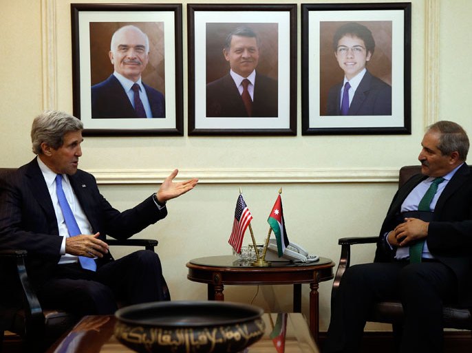 US Secretary of State John Kerry (L) meets with Jordan’s Foreign Minister Nasser Judeh on May 22, 2013. Backers of the Syrian uprising are meeting in Amman to discuss a US-Russian proposal for peace talks, as the brutal two-year conflict escalates close to the border with Lebanon. Eleven top diplomats from Britain, Egypt, France, Germany, Italy, Jordan, Qatar, Saudi Arabia, Turkey, the United Arab Emirates and the United States are attending the meeting of the so-called Friends of Syria group. AFP PHOTO/JIM YOUNG/POOL