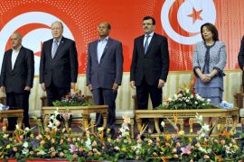 FB59 - Tunis, -, TUNISIA : (LtoR) LTDH President Abdessattar Moussa, head of the Tunisian General Labour Union (UGTT) Houcine Abbassi, Tunisian Constituent Assembly's President Mustapha Ben Jaafar, Tunisian President Moncef Marzouki, Prime Minister Ali Laarayedh, UTICA President Wided Bouchamaoui and the president of the National Bar Association, Chawki Tabib pose before a meeting to reach an agreement on the content and the schedule of the adoption of the new constitution on May 16, 2012 in Tunis. The meeting, called by the UGTT, Tunisia's main trade union, gathers for a second round of talks organizations, associations and political groups, including the ruling Islamist party Ennahda who boycotted the first meeting. AFP PHOTO / FETHI BELAID