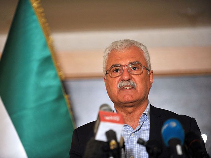 President of the Syrian National Council (SNC) George Sabra attends a press conferance on May 25, 2013, in Istanbul. The main opposition National Coalition has met in Istanbul for three days trying to overcome deep divisions over Russian and US proposals to convene a conference to which representatives of President Bashar al-Assad would be invited without any formal precondition for him to step down. "Thousands of Iranian forces and its terrorist collaborators from Hezbollah are invading Syria. The invading fighters are besieging, shelling and trying to assault several towns, among them Qusayr and Homs (in central Syria) " acting National Coalition chief George Sabra said at the summit. AFP PHOTO / OZAN KOSE