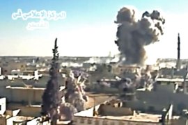 A image grab taken from a video uploaded on Youtube by Al-Qusayr Media Centre on May 26, 2013 allegedly shows smoke billowing from buildings in the city of Qusayr, in Syria's central Homs province, following an airstrike by government forces. Forces loyal to Syria's President Bashar al-Assad supported by Hezbollah fighters launched an assault on Qusayr a week ago but are still being fiercely resisted by rebels.  AFP PHOTO / HO /AL-QUSAYR MEDIA CENTRE