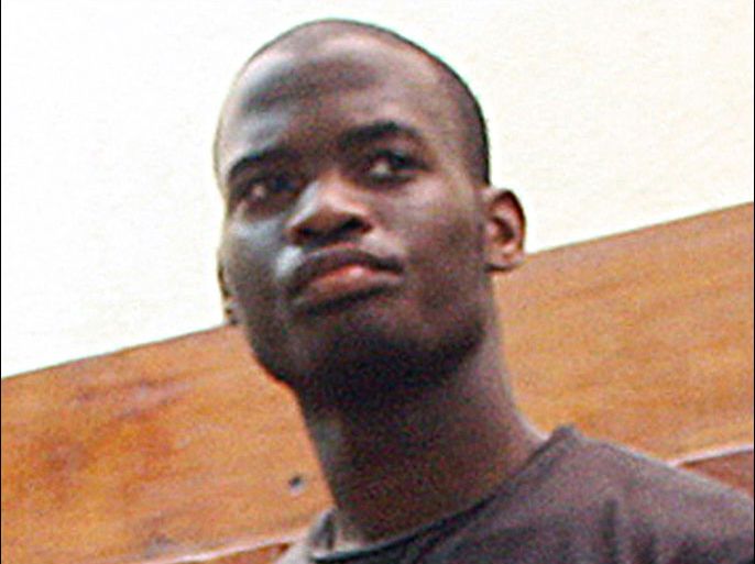 (FILES) This photo taken on November 23, 2010 shows Michael Adebolajo among the nine suspected members of the Al-Shabaab Movement (unpictured) arrested by Kenyan police on November 22 on claims of being Al-Shabaab recruits on their way to Somalia at the weekend. Michael Adebolajo, one of the main suspects in the brutal murder of a soldier in London, was arrested in Kenya more than two years ago for seeking terror training, it emerged on May 26, 2013, after police made more arrests. The reports said Adebolajo, 28, had been accused of trying to lead a group of youths trying to join Somalia's Al-Qaeda-linked Shebab movement. The disclosure raises fresh questions about the monitoring of Adebolajo and the other suspect in the murder, 22-year-old Michael Adebowale, by Britain's intelligence services. AFP PHOTO / MICHAEL RICHARDS