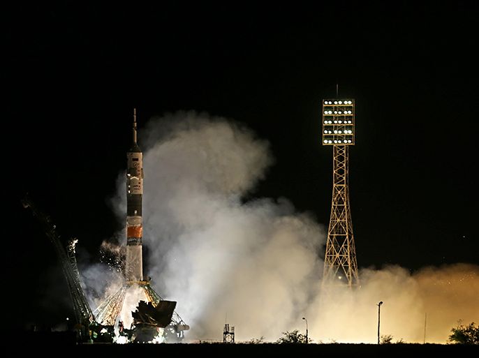 epa03721797 The Russian Soyuz TMA-09M rocket lifts off from Baikonur cosmodrome in Kazakhstan, early 29 May 2013, carrying three members of the expedition, Russian cosmonaut Fyodor Yurchikhin, US astronaut Karen Nyberg and Italian astronaut Luca Parmitano, to the International Space Station (ISS). EPA/MAXIM SHIPENKOV