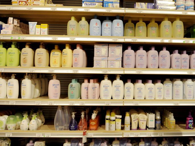 epa01670566 A woman shops for children's bath products, including Johnson's Baby Shampoo, at a store in New York, New York, USA, on 19 March 2009. A recent study conducted by the consumer group Campaign for Safe Cosmetics found dozens of children's bath products, including Johnson's Baby Shampoo, contain carcinogens. EPA/JUSTIN LANE