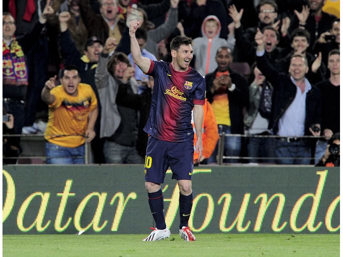 JL020 - Barcelona, -, SPAIN : Barcelona's Argentinian forward Lionel Messi celebrates his first goal during the Spanish league football match FC Barcelona vs Real Betis at the Camp Nou stadium in Barcelona on May 5, 2013. AFP PHOTO/ JOSEP LAGO
