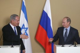 Russia's President Vladimir Putin (R) and Israeli Prime Minister Benjamin Netanyahu attend a joint press conference after their meeting at Putin's residence in the Black Sea resort of Sochi, on May 14, 2013. Putin warned today against any moves that would further destabilise the situation in Syria, speaking after talks with the visiting Israeli Prime Minister