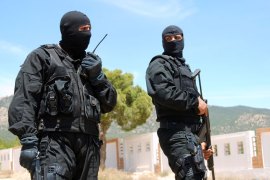 Tunisian special forces stand guard in Kasserine, the regional capital of the western region of Mount Chaambi, on May 7, 2013, as soldiers continue their hunt for a jihadist group hiding out in the the border region with Algeria.