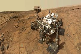 This self-portrait of NASA's Mars Curiosity rover is shown in this NASA handout composite image released May 30, 2013. Radiation levels measured by Curiosity show astronauts likely would exceed current U.S. exposure limits during a roundtrip mission to Mars, scientists said on Thursday. The image combines dozens of exposures taken by Curiosity's Mars Hand Lens Imager (MAHLI) on February 3, 2013 and three exposures taken May 10, 2013, to update the appearance of part of the ground beside the rover. The updated area (bottom, L) shows gray-powder and two holes where Curiosity used its drill on a rock target named "John Klein", displaying how the site where the self-portrait was taken appeared by the time it was ready to drive away from that site in May 2013. REUTERS/NASA/Handout via Reuters (OUTER SPACE - Tags: SCIENCE TECHNOLOGY) ATTENTION EDITORS - THIS IMAGE HAS BEEN SUPPLIED BY A THIRD PARTY. IT IS DISTRIBUTED, EXACTLY AS RECEIVED BY REUTERS, AS A SERVICE TO CLIENTS. FOR EDITORIAL USE ONLY. NOT FOR SALE FOR MARKETING OR ADVERTISING CAMPAIGNS